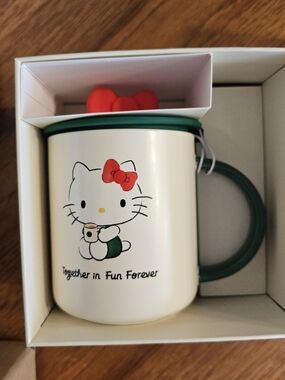 Hello Kitty Ceramic Mug with Red Bow and Green Handle